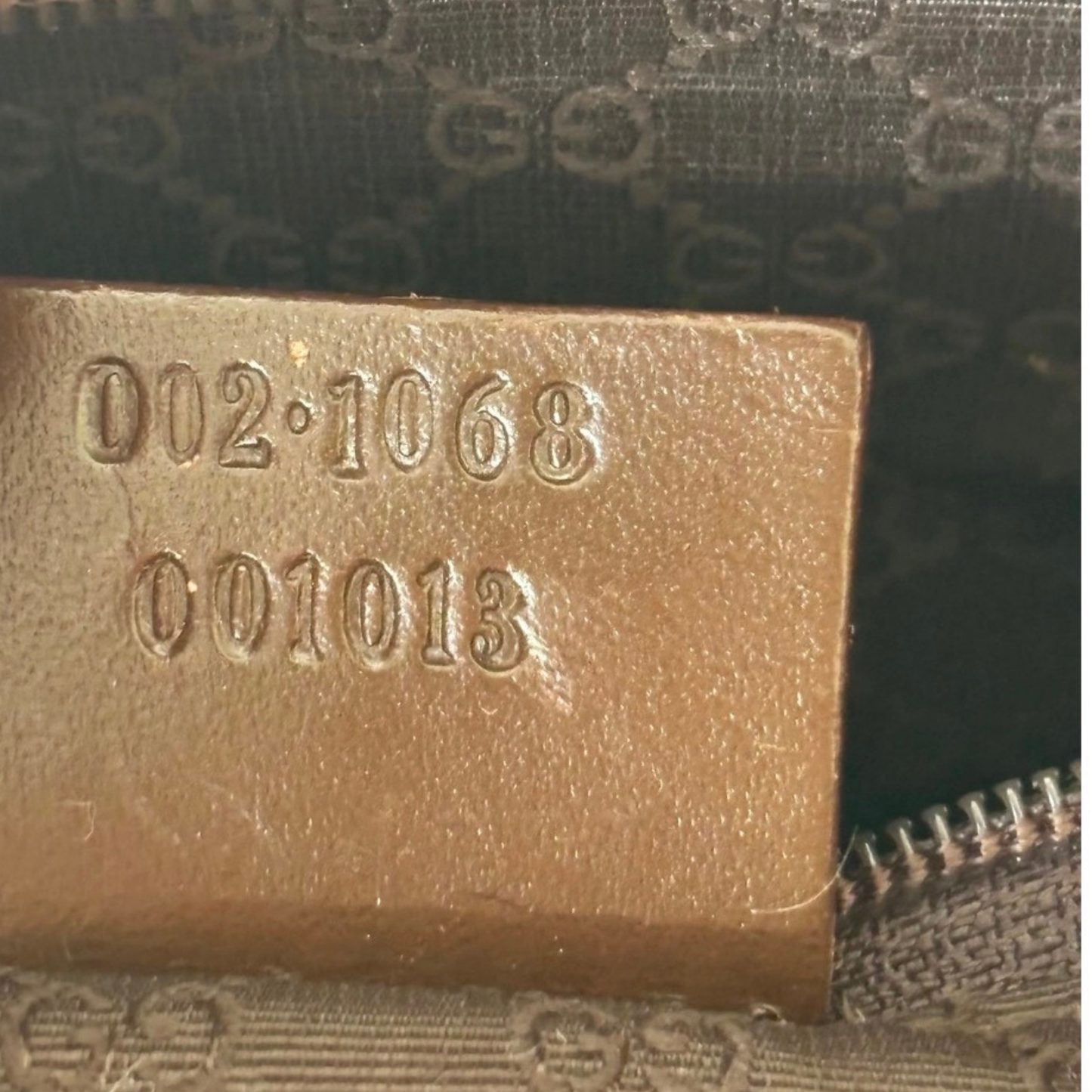 close up of serial numbers for Gucci Jackie
