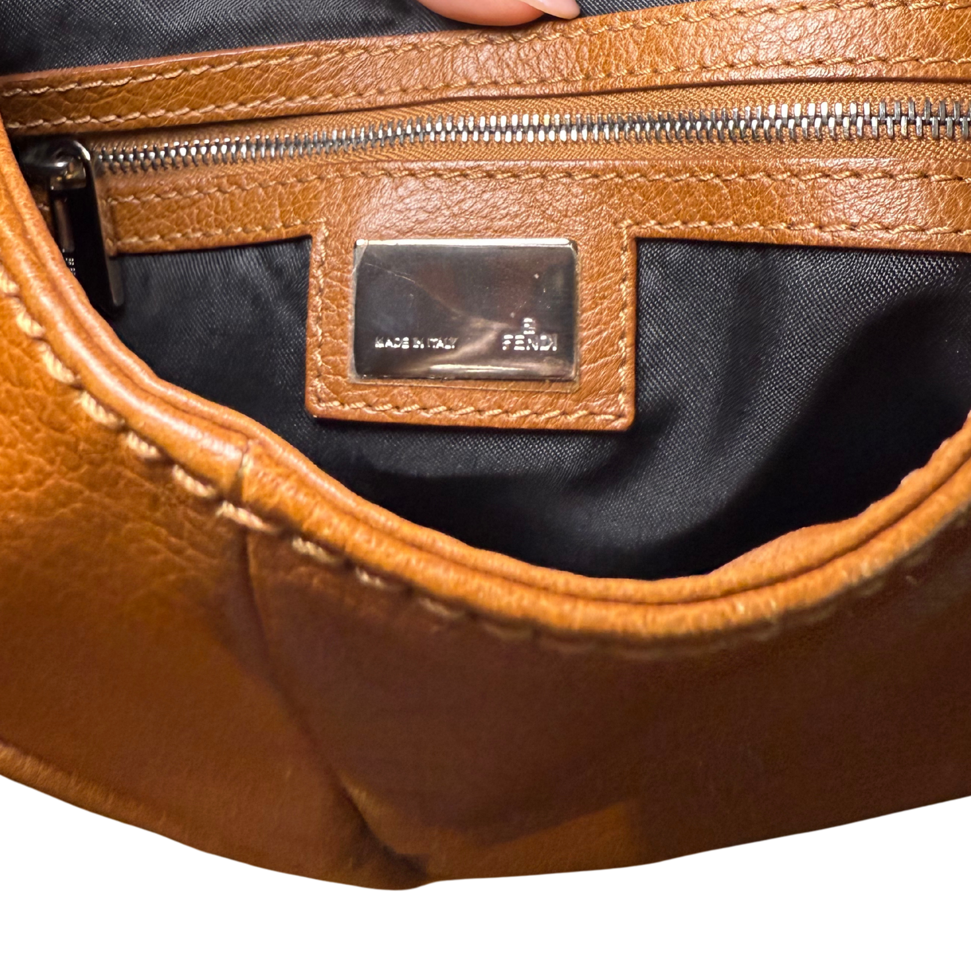 Fendi Hobo leather bag with a visible brand logo 