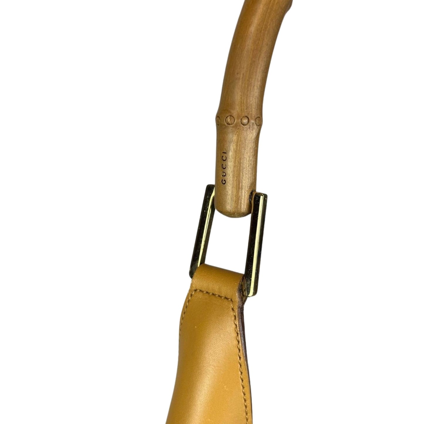 Close-up of a bamboo trap with Gucci Logo