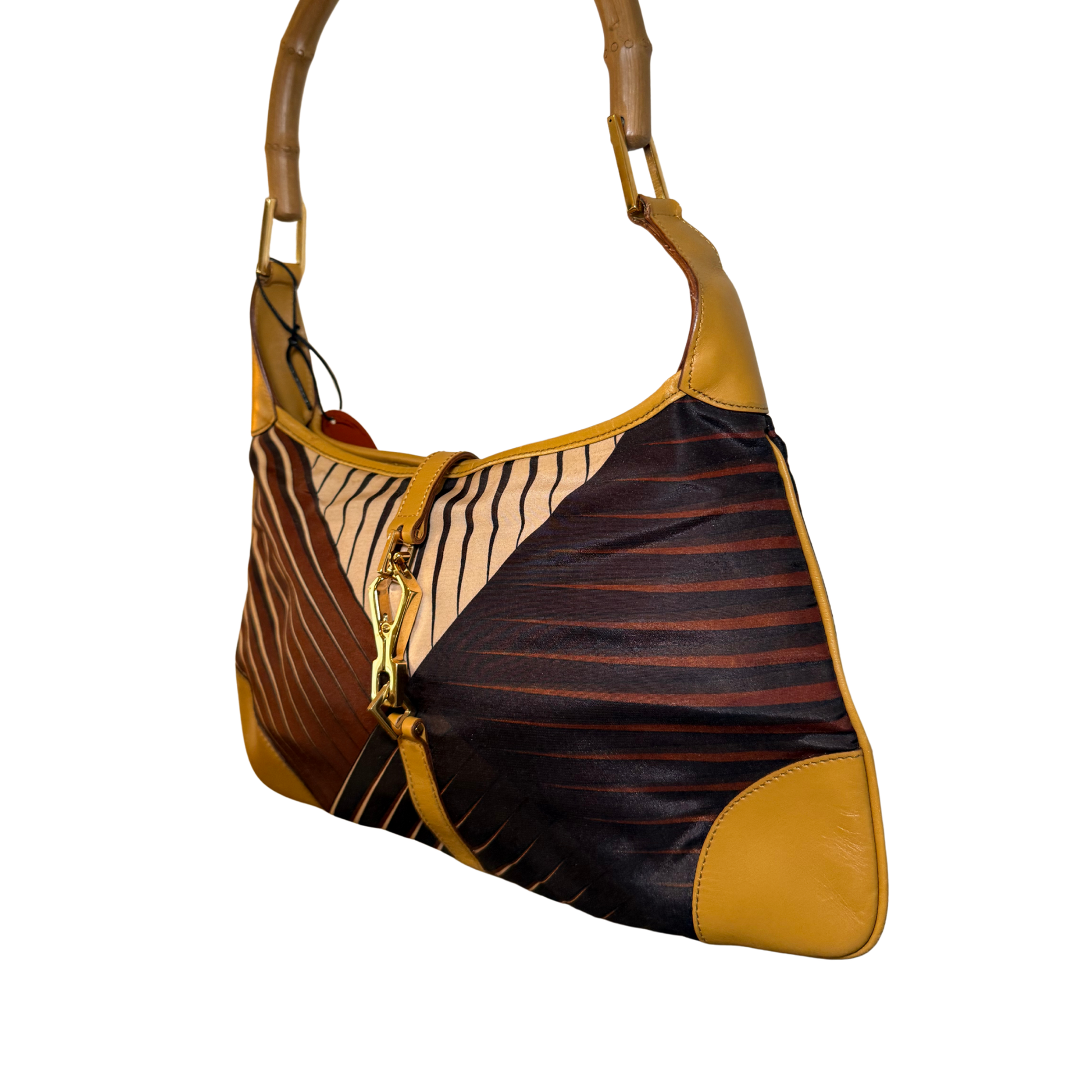 Gucci Handbag with Geometric print and brown leather accents 