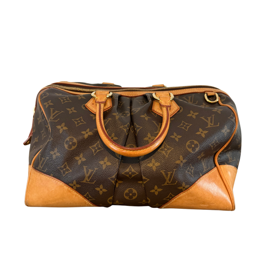 Designer Louis Vuitton handbag with monogram pattern 