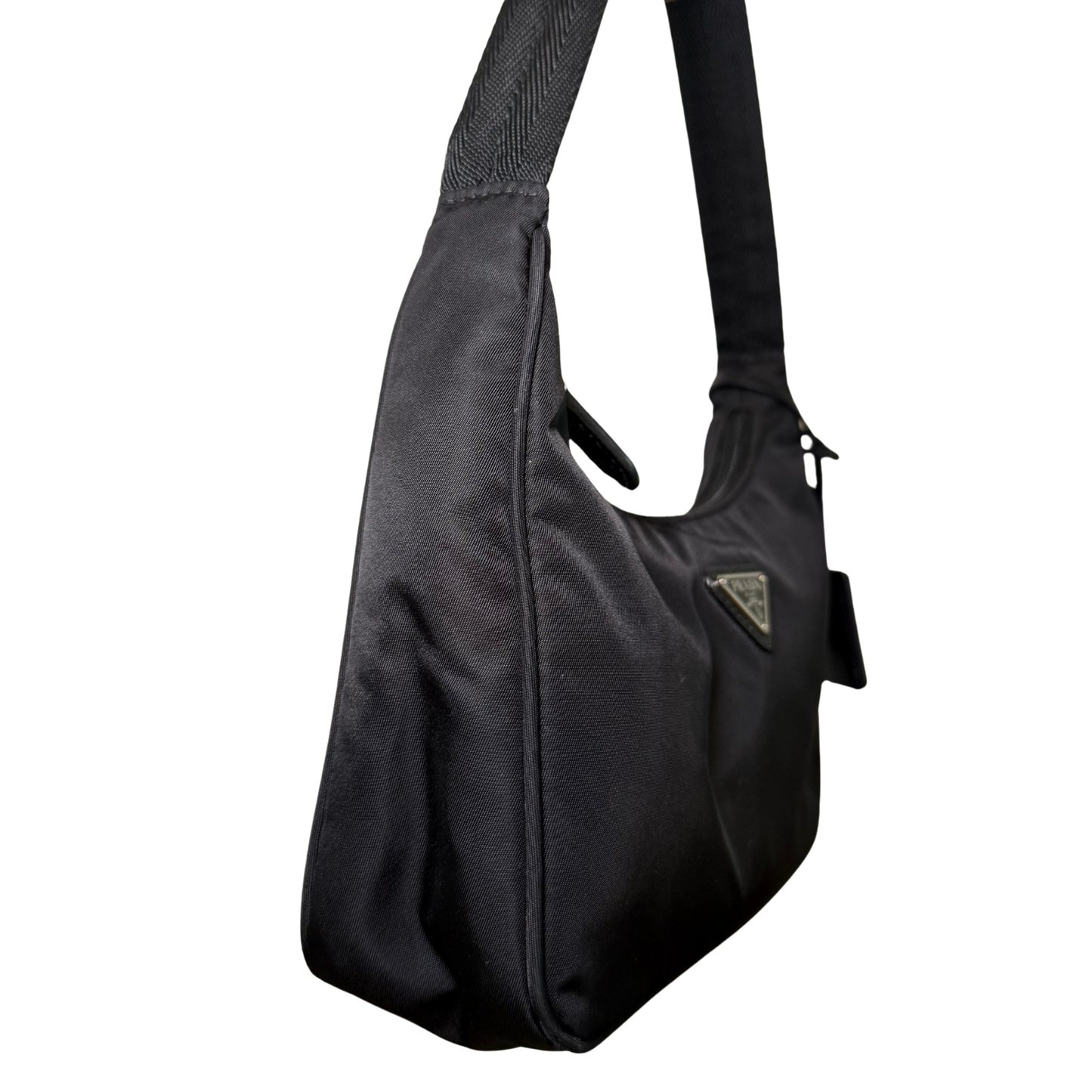 Side view of Prada Re-Nylon Re-Edition 2000 Bag in excellent condition