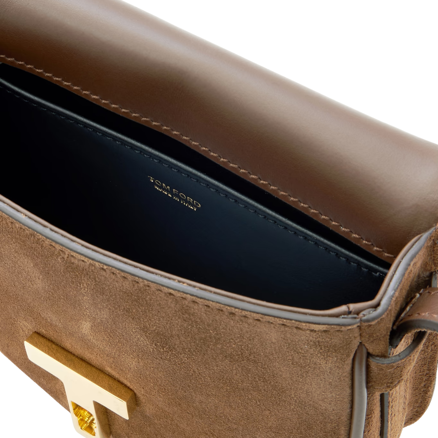 Interior of Tom Ford Wallis crossbody showing black leather and logo.